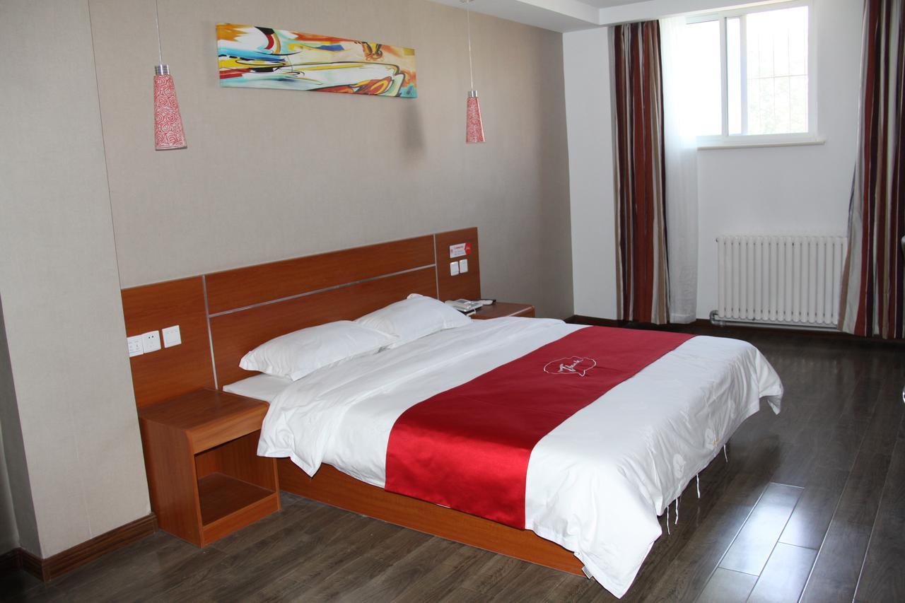 Thank Inn Chain Hotel Shandong Liaocheng Economic Development Zone Jiuhe Community ภายนอก รูปภาพ